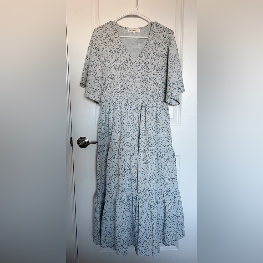 From boutique, “Called to Surf.” Bell sleeves and mid-calf. Smocked on bust.